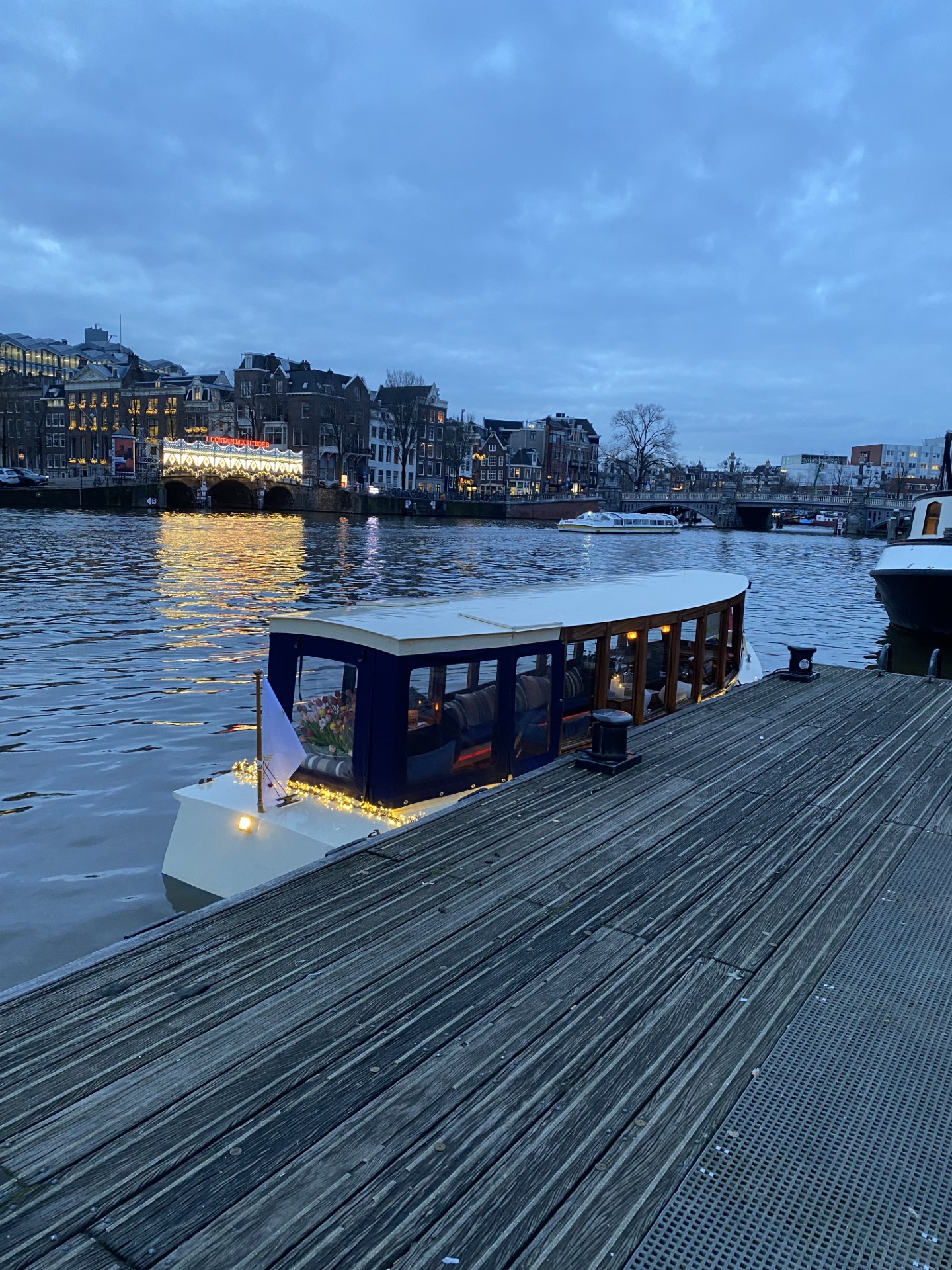 Historic salon boat Energie in Amsterdam in winter